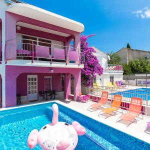 Beachfront villas Pinky-Superior heated pools and jacuzzi just 25 m from see