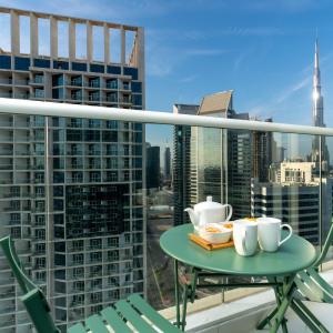 Vacay Lettings - Burj Khalifa & Canal view Studio at Damac Prive