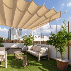 Tentudia Apartments with Private Roof-Top or Patio and FREE Underground Parking via Car Lift -Medium Size Car- By OCityzen