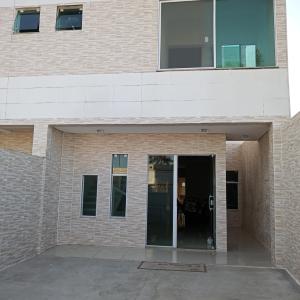 Casa A de veraneio com estacionamento fechado