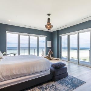 Elegant 6 BR Condo with Beach and City Views, 2 large balconies, Next to the Hangout!