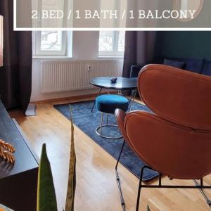 Design Altbauwohnung mit Balkon und Parkplatz