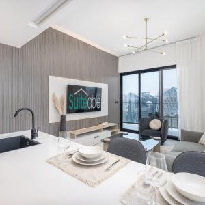 Canal front apartment with Burj Khalifa view by Suiteable