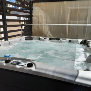 Aqua Dreams - Hot Tub Cabin | Foosball, Arcade, Fireplaces