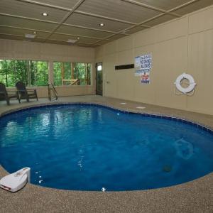 Swim Year-Round, Sip Fireside, Host Movie Nights, Play Pool & Soak in the Hot Tub - Mystic Timber