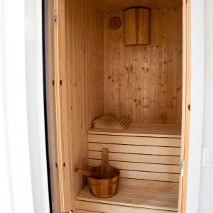 Your own 30sqm house with kitchen, sauna and loft.
