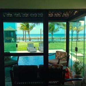 Casa à beira-mar 23 - Pé na Areia, Tipo Bangalô, Piscina Privativa, Muro Alto, Porto de Galinhas, PE
