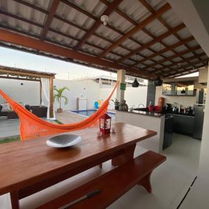 CASA COM PISCINA NA PRAIA