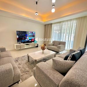 Calm Chaos 4 BR Villa with maid Room in Damac Hills 2 By Bhavan Vacation Homes