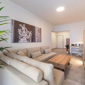 Modern Mythic Flat with Greek-Inspired Artistic
