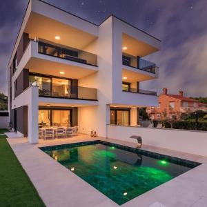 Deluxe villa with heated pool, whirpool, sea view near beautiful beach III - by Traveler tourist agency Krk ID 2402
