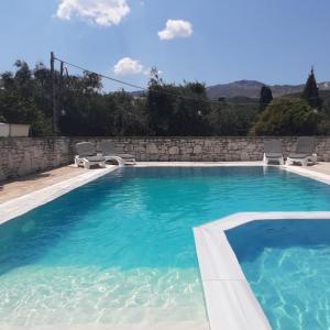 Villa Petrino - central flat location within Kassiopi. Sleeps 8