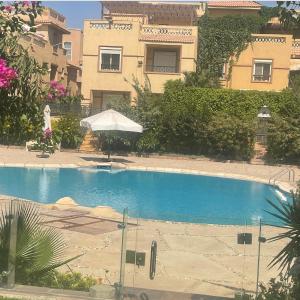 Apartment in a villa with pool and garden