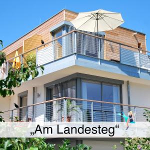 Ferienwohnung Am Landesteg - Maisonette mit 2 Balkonen exklusiv und am See