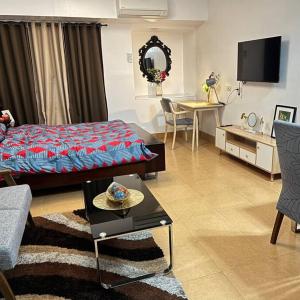 Spacious Condo in Q.C. w/ wifi,near SM North