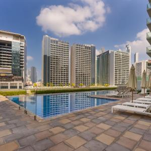 Oraya - Cozy 2BR in Reva Residence I Direct Pool Access