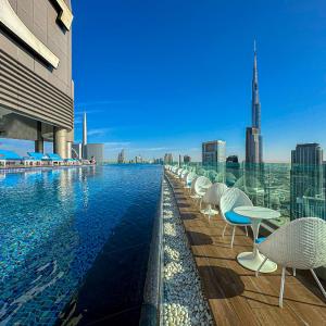 Super High Infinity Pool and amazing Burj Khalifa View 3 Bedroom apartment in Paramount Hotel Midtown