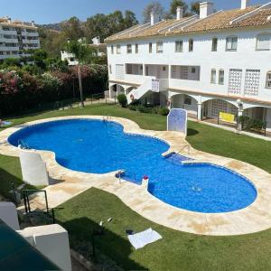 Spacious, calm and bright Duplex Apartment in Private Residence ideal for families, beach and golf