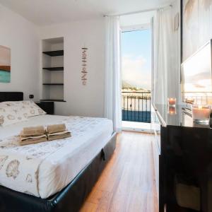 Trilocale sulla Spiaggia - Parcheggio Privato