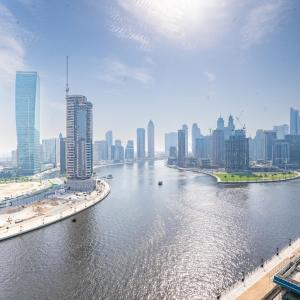 Escape24 Stylish 2BR Apartment at Damac Maison Privé, Business Bay with Canal View