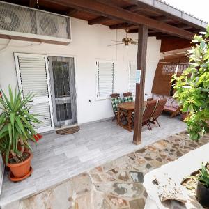 Sardinian Cottage, 150m from the sea, private Garden