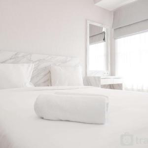 Modern Look and Comfy Studio Citra Living Apartment By Travelio