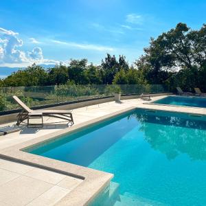 The Modern Apartment in the Nature with a Pool & Gym