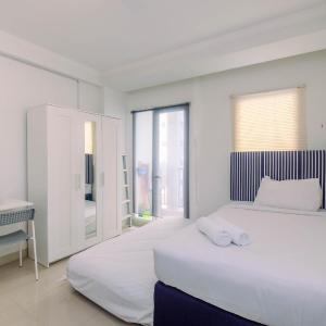 Simply Clean and Spacious Studio Signature Park Grande Apartment By Travelio