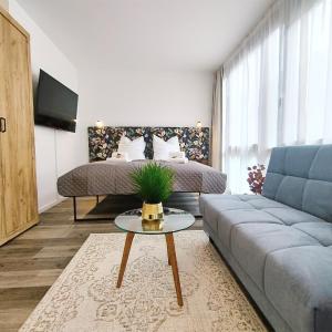 Design Apartment für bis zu 4 im 2 OG, modern, Dachterrasse, Grill, ruhige Lage, Disney plus, Wii, LAN und WLAN