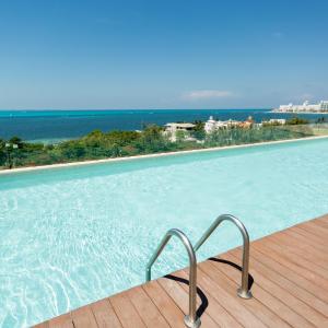 Departamento en Zona Hotelera con acceso a alberca en rooftop