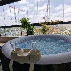 Luxueux Studio avec jacuzzi et salle de sport