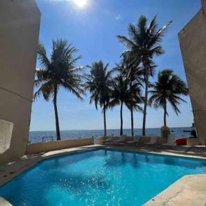 Beautiful Beachfront Apartment with Pool Relaxing Getaway