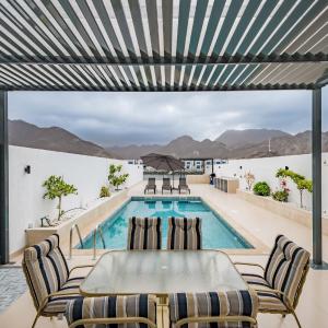 Deal of the Week 4BR with Pool, Sea & Mountain Views by Deluxe Holiday Homes