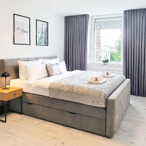 LIVATION - Apartments Hamm-Mitte - 2 Zi - Nespresso - SmartTV - freeWiFi - ausgestattete Küche - 24h Check-In - bis 4 Pers pro Apartment