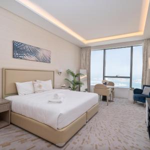 Nasma Luxury Stays - Sea-View Studio in Palm Tower with Full Amenities