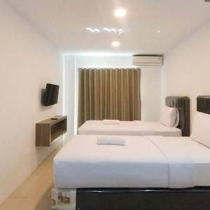 Simply Look and Cozy Studio at De Prima Apartment By Travelio