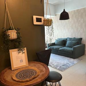 1br wNetflix Disneyplus and pool across SM Megamall Ortigas CBD