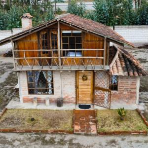 Cabaña en el Campo Malchinguí WIFI 24 horas