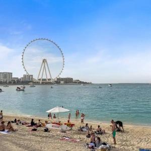 4BR Jumeirah Beach Stay with Dubai Eye Views & Near Marina Walk