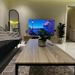 Self-Entry Apartment in Almasif Living Room and Bedroom