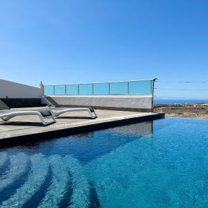 Villa con vista al mar y piscina privada
