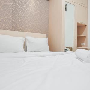 Cozy Stay at 2BR Green Pramuka City Apartment near Shopping Center By Travelio