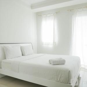 Cozy Stay Studio Signature Park Grande Apartment By Travelio