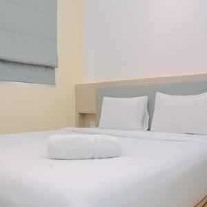 Warm and Cozy 2BR Signature Park Grande Apartment By Travelio