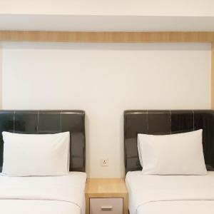Homey Studio at De Prima Apartment By Travelio