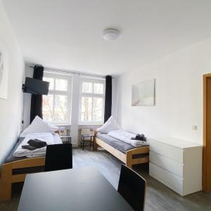Top-Lage Apartments für 4 Personen, Premium mit Doppelbett oder Standard mit Einzelbetten