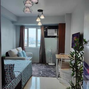 15th Floor Cozy Studio Unit with Netflix, AC and Free Wifi in Mplace