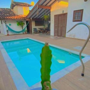 Suite privativa com piscina e area gourmet