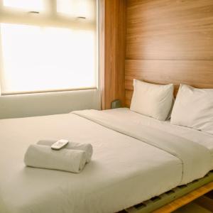 Comfort and Simple 2BR at Green Pramuka City Apartment By Travelio