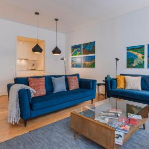 Downtown by the River Apartment by LovelyStay